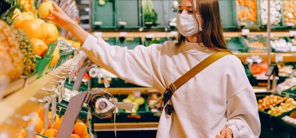 woman wearing mask in supermarket